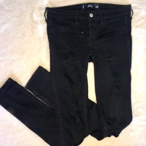 Black ripped jeans.